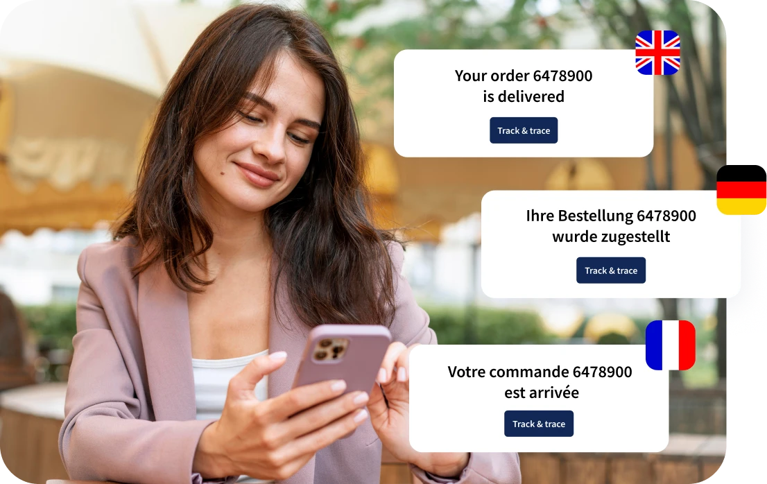 Woman holding phone with multilingual delivery notifications.