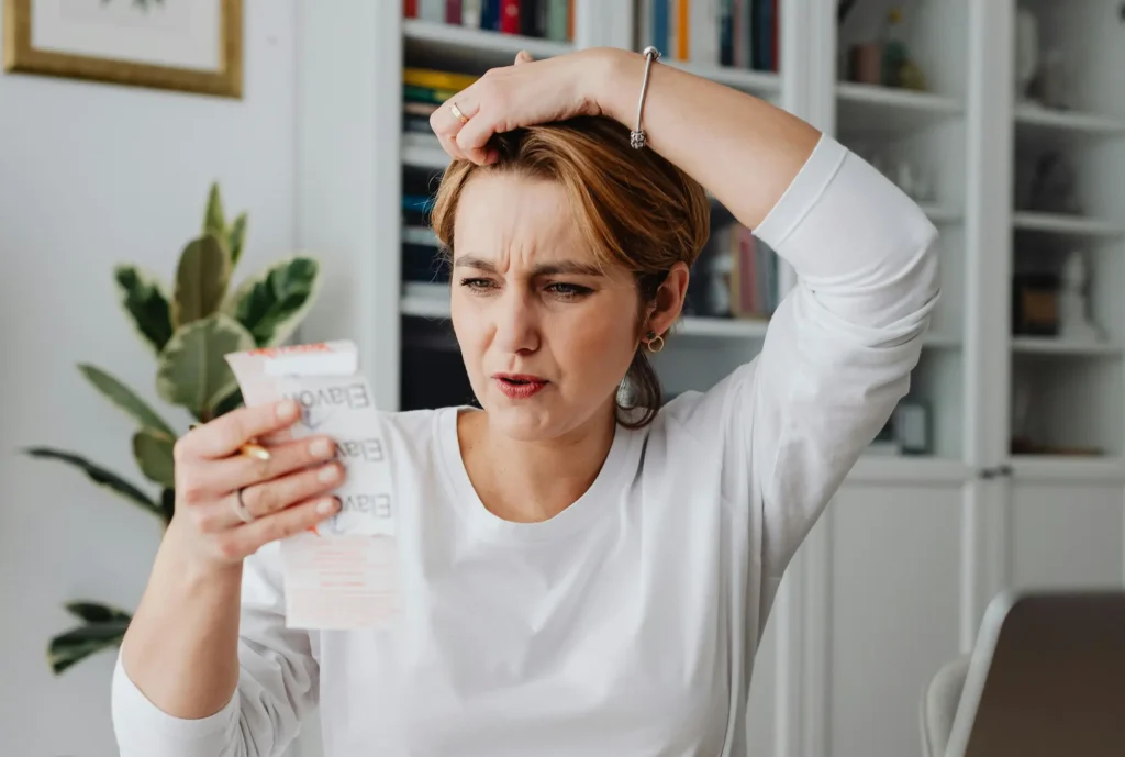 woman calculating the total cost of shipping