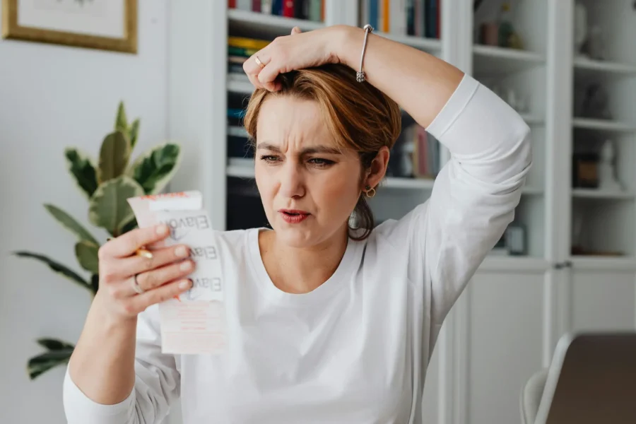 woman calculating the total cost of shipping