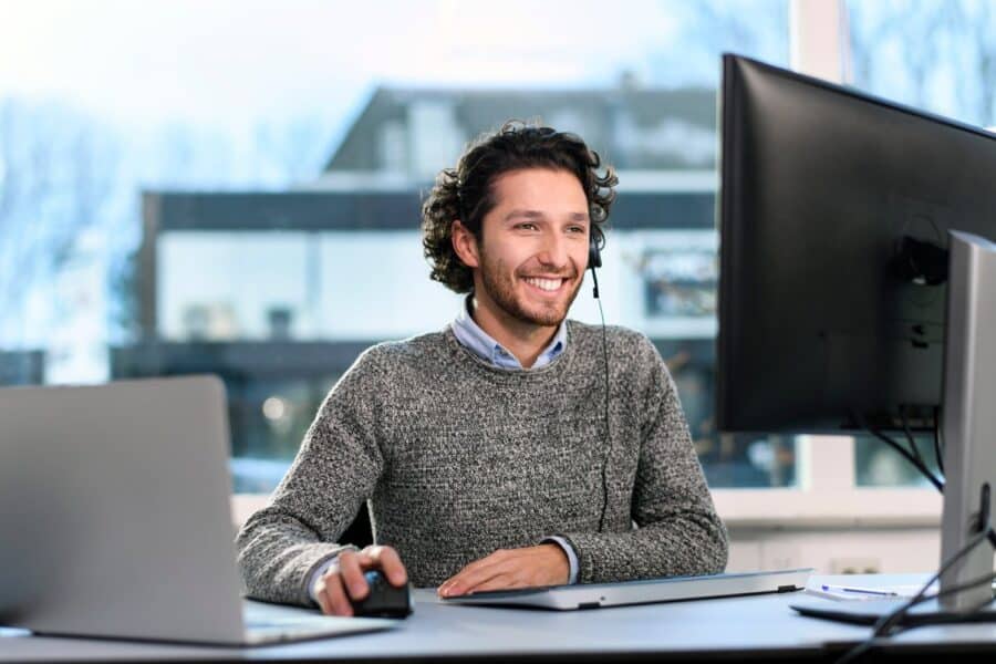 E-commerce customer support person behind computer